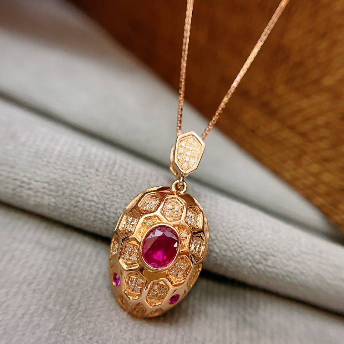 14k Gold 0.55 Ct Natural Ruby & Diamond Pendant( Without Chain ): Ref:230938120 // gold content:14k gold // main gemstone:ruby // shape:oval // carat weight:0. 55ct // color:red // treatment:natural // // adjacent gemstone 2 : diamond // number of stones:63 //