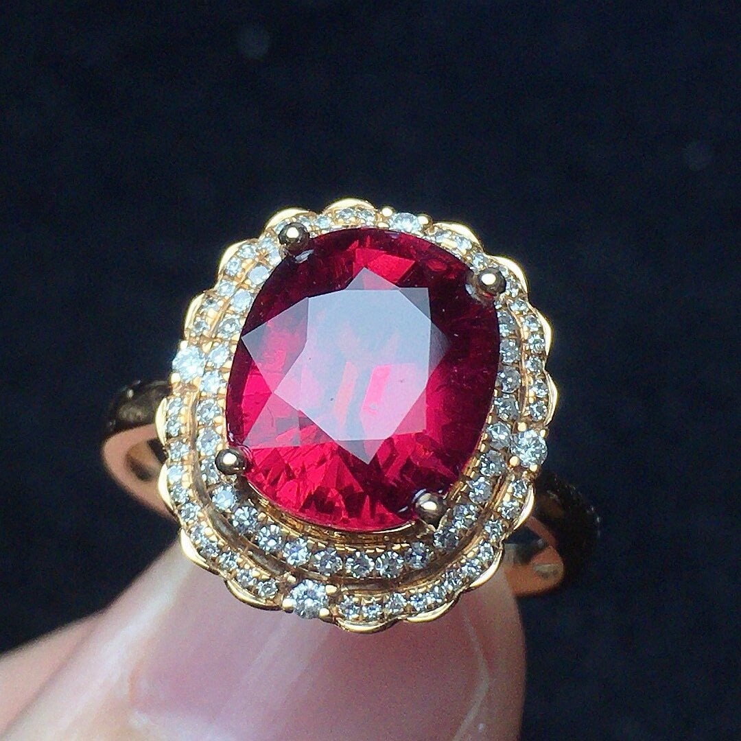 14k Gold 3.53 Ct Natural Tourmaline & Diamond Ring: Ref:230938249 // gold content:14k gold // ring size:7. 25us // // main gemstone:tourmaline // shape:oval // carat weight:3. 53ct // color:red // treatment:natural // // adjacent gemstone 2 :