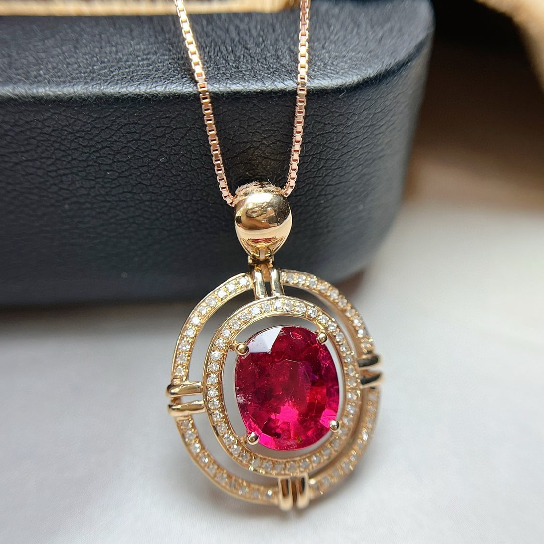 14k Gold 1.90 Ct Natural Tourmaline & Diamond Pendant( Without Chain ): Ref:230938284 // gold content:14k gold // main gemstone:tourmaline // shape:oval // carat weight:1. 90ct // color:red // treatment:natural // // adjacent gemstone 2 : diamond // number of stones:79