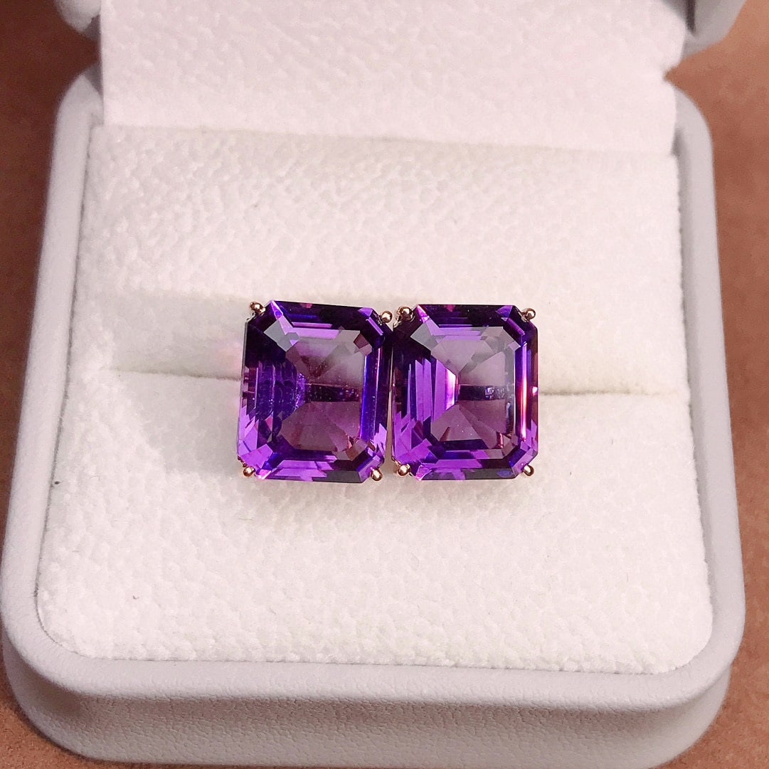 14k Gold 12.3 Ct Natural Amethyst Earrings: Ref:230938289 // gold content:14k gold // main gemstone:amethyst // shape:octagonal // carat weight:12. 3ct // color:purple // treatment:natural // Condition: New Low Estimate: 1900.00 High Estimate: