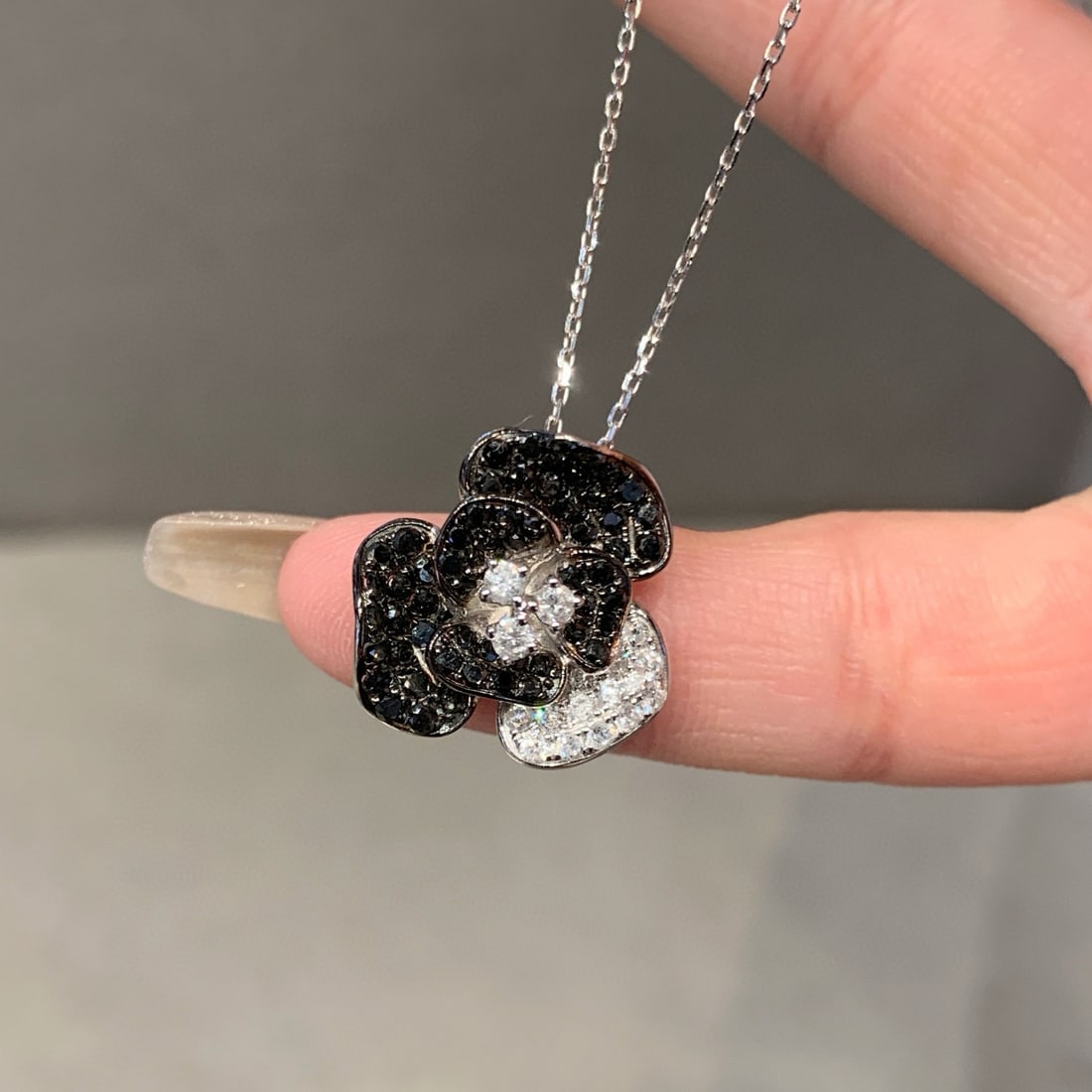 14k Gold 1.35 Ct Natural Black Diamond & Diamond Flowers Necklace: Ref:230938294 // gold content:14k gold // main gemstone:diamond // shape:round // carat weight:1. 35ct // color:black & white // treatment:natural // cut grade:g // Condition: NewLow Estimate: