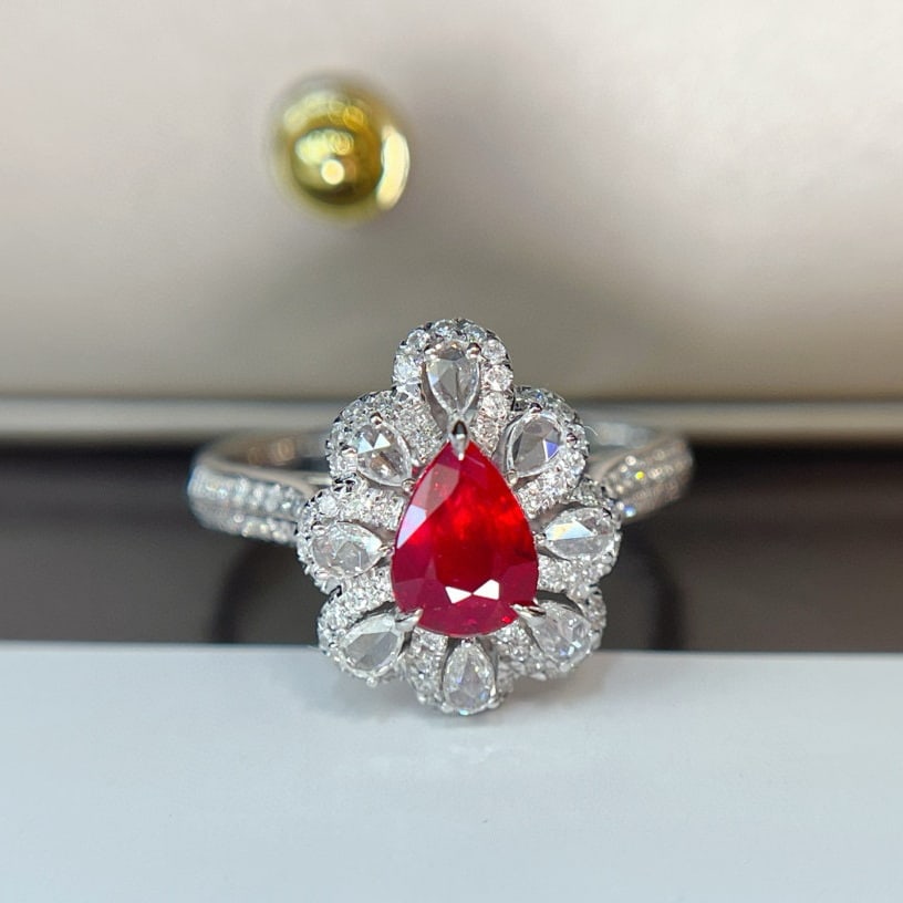 14k Gold 1.05 Ct Natural Ruby & Diamond Ring: Ref:230938310 // gold content:14k gold // ring size:7. 25us // // main gemstone:ruby // shape:pear // carat weight:1. 05ct // color:pigeonblood red // treatment:natural // // adjacent gemstone 2 : dia
