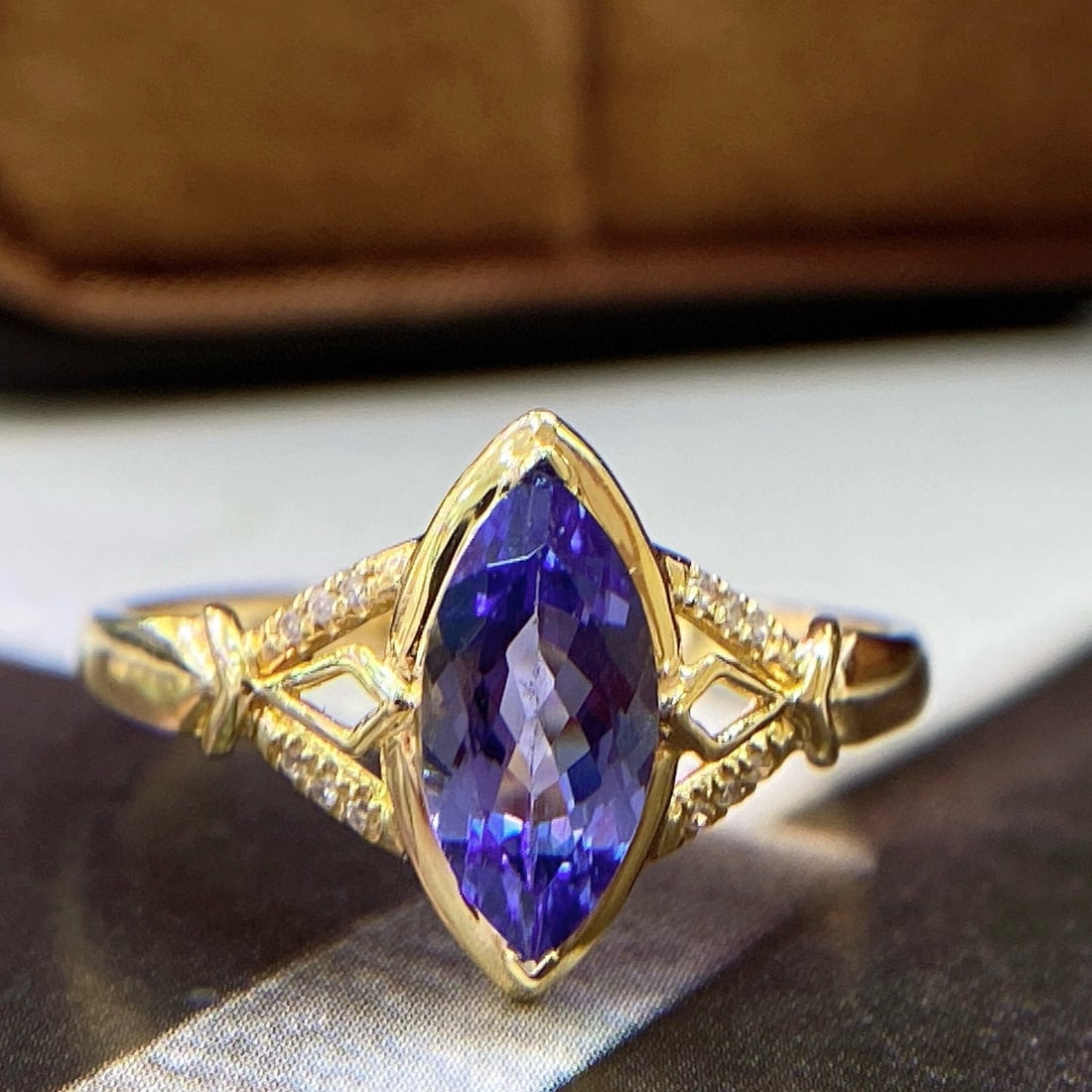 14k Gold 1.15 Ct Natural Tanzanite & Diamond Ring: Ref:230938311 // gold content:14k gold // ring size:7. 25us // // main gemstone:tanzanite // shape:marquise // carat weight:1. 15ct // color:blue // treatment:natural // // adjacent gemstone 2 :