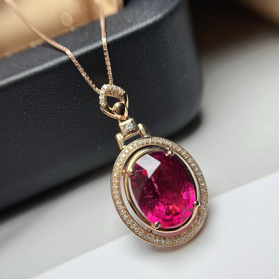 14k Gold 3.40 Ct Natural Tourmaline & Diamond Pendant( Without Chain ): Ref:230938312 // gold content:14k gold // main gemstone:tourmaline // shape:oval // carat weight:3. 40ct // color:red // treatment:natural // // adjacent gemstone 2 : diamond // number of stones:63