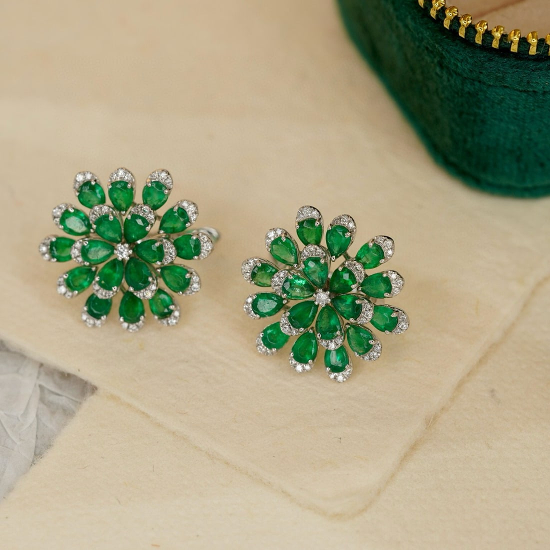 14k Gold 5.82 Ctw Vivid Green Natural Emerald & Diamond Earrings: Ref:230938334 // gold content:14k gold // main gemstone:emerald // shape:pear // carat weight:5. 46ct // color:vivid green // treatment:natural // // adjacent gemstone 2 : diamond // shape:round //