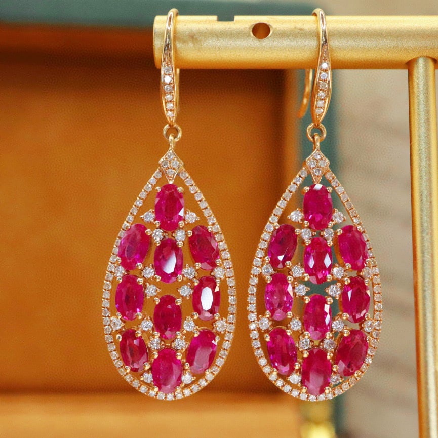 14k Gold 6.33 Ctw Natural Ruby & Diamond Earrings: Ref:230938341 // gold content:14k gold // main gemstone:ruby // shape:oval // carat weight:5. 55ct // color:red // treatment:natural // // adjacent gemstone 2 : diamond // number of stones:176 //