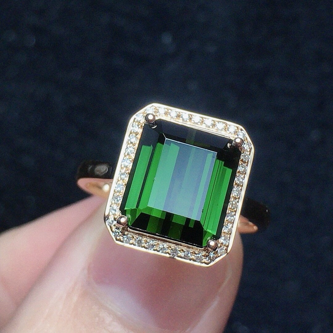 14k Gold 4.56 Ct Natural Tourmaline & Diamond Ring: Ref:230938342 // gold content:14k gold // ring size:7. 25us // // main gemstone:tourmaline // shape:octagonal // carat weight:4. 56ct // color:green // treatment:natural // // adjacent gemstone 2