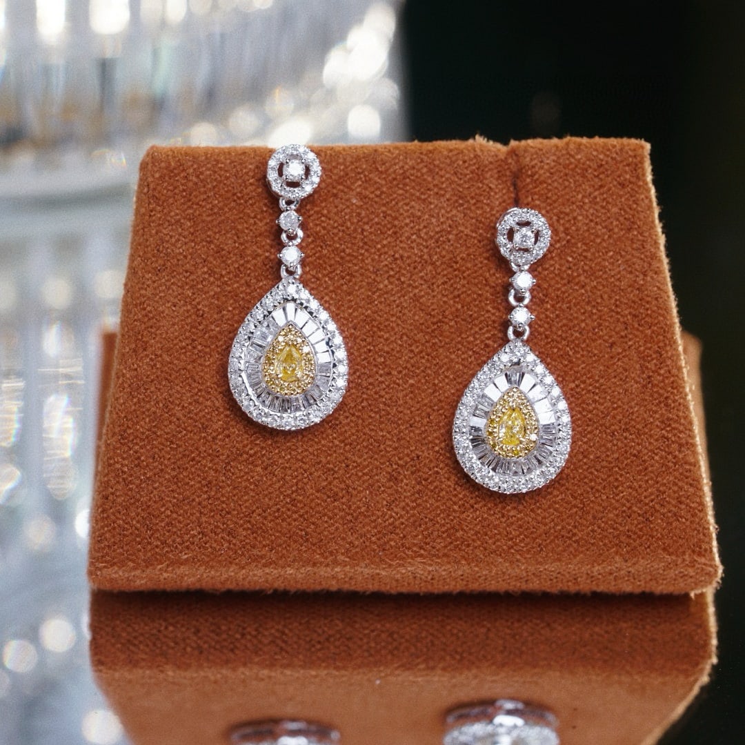 14k Gold 0.80 Ct Natural Color Diamond Earrings: Ref:230938368 // gold content:14k gold // main gemstone:diamond // shape:multiply // carat weight:0. 80ct // clarity grade:vs-si // color:color // treatment:natural // Condition: NewLow Estimate: