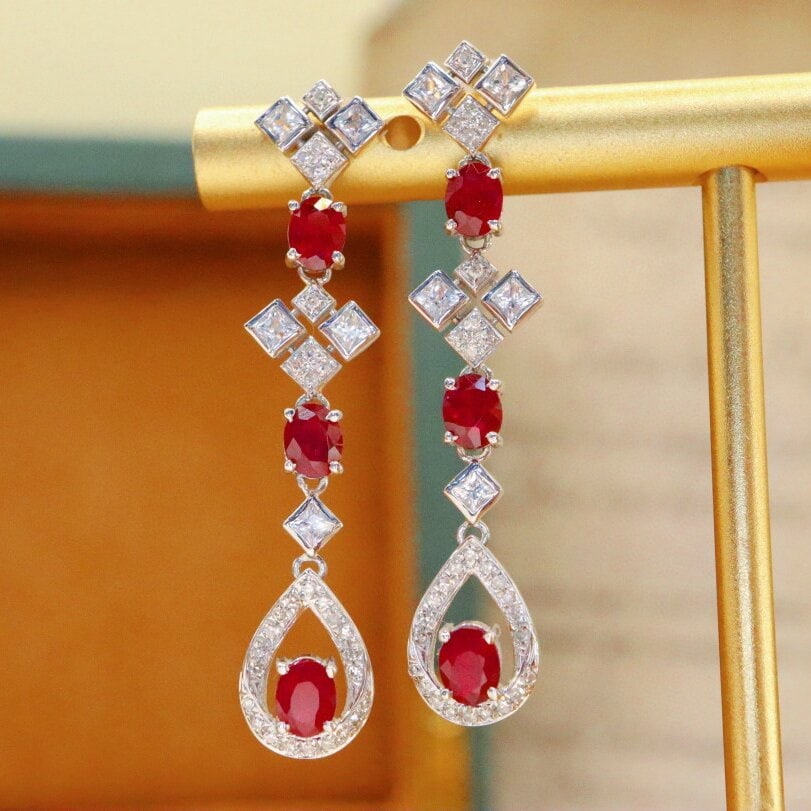 14k Gold 1.74 Ctw Natural Ruby & Diamond Earrings: Ref:230938419 // gold content:14k gold // main gemstone:ruby // shape:oval // carat weight:1. 56ct // color:pigeonblood red // treatment:natural // // adjacent gemstone 2 : diamond // number of