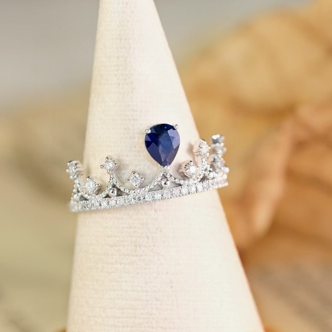 14k Gold 0.88 Ctw Natural Sapphire & Diamond Ring: Ref:230938427 // gold content:14k gold // ring size:7. 25us // // main gemstone:sapphire // shape:pear // carat weight:0. 6ct // color:blue // treatment:natural // // adjacent gemstone 2 : diamond