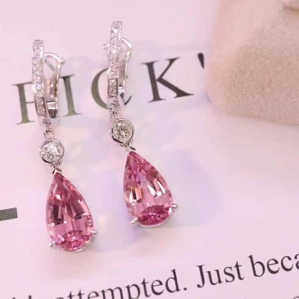 14k Gold 5.57 Ctw Natural Tourmaline & Diamond Earrings: Ref:230938435 // gold content:14k gold // main gemstone:tourmaline // shape:pear // carat weight:5. 27ct // color:pink // treatment:natural // // adjacent gemstone 2 : diamond // shape:round //