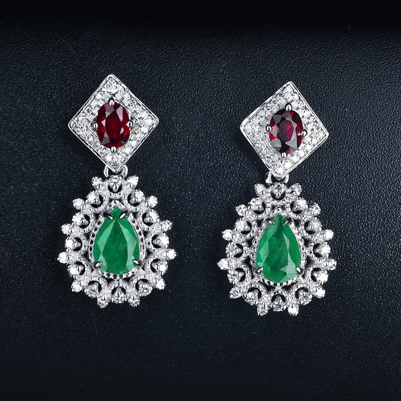 14k Gold 1.5 Ctw Natural Emerald & Ruby Earrings: Ref:230977045 // gold content:14k gold // main gemstone:emerald // shape:pear // carat weight:1ct // color:green // treatment:natural // // adjacent gemstone 2 : ruby // shape:oval // carat