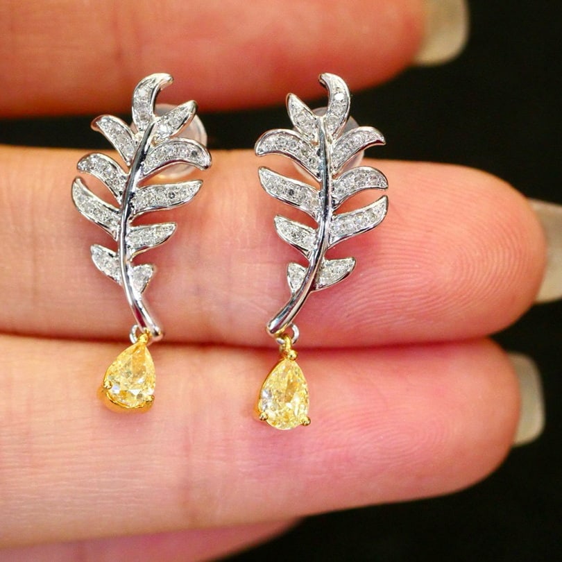 14k Gold 0.63 Ctw Natural Yellow Diamond & Diamond Earrings: Ref:230977076 // gold content:14k gold // main gemstone:yellow diamond // shape:pear // carat weight:0. 51ct // color:yellow // treatment:natural // // adjacent gemstone 2 : diamond // shape:round