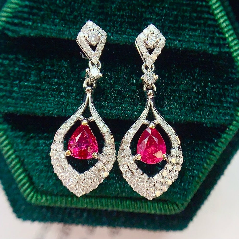 14k Gold 1 Ct Natural Ruby & Diamond Earrings: Ref:230977084 // gold content:14k gold // main gemstone:ruby // shape:pear // carat weight:1ct // color:red // treatment:natural // // adjacent gemstone 2 : diamond // number of stones:113 //