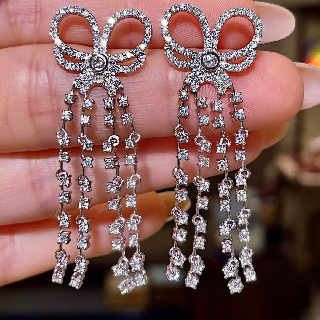 14k Gold 2.2 Ct Natural H Diamond Earrings: Ref:230977126 // gold content:14k gold // main gemstone:diamond // shape:round // carat weight:2. 2ct // clarity grade:vs-si // color:h // treatment:natural // cut grade:g // Condition: NewLow