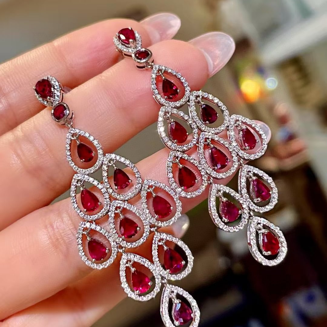 14k Gold 8.42 Ctw Natural Ruby & Diamond Earrings: Ref:230977179 // gold content:14k gold // main gemstone:ruby // shape:pear // carat weight:6. 67ct // color:red // treatment:natural // // adjacent gemstone 2 : diamond // shape:round // carat