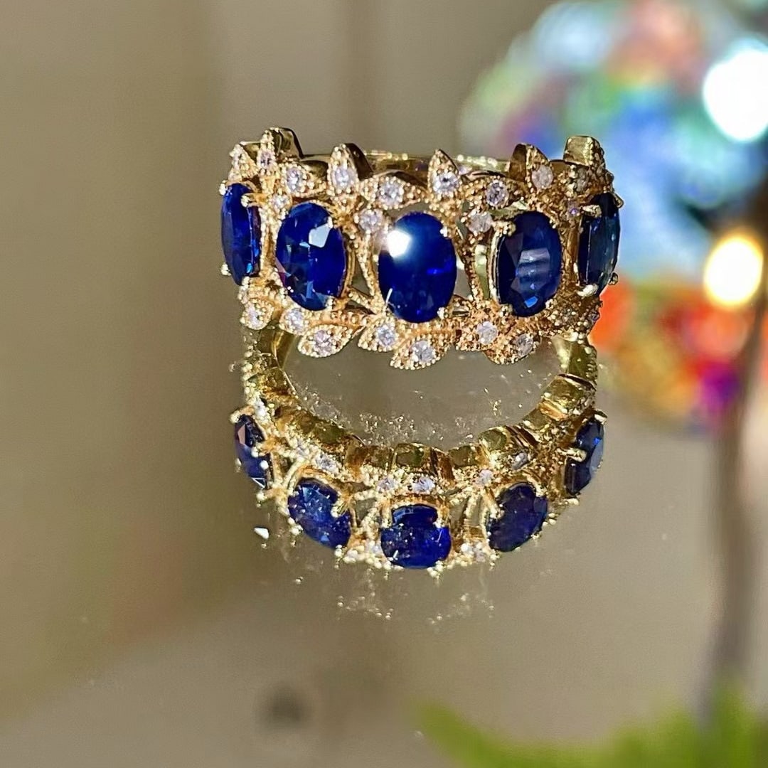 14k Gold 2.57 Ctw Natural Sapphire & Diamond Ring: Ref:230977221 // ring size:7. 25us // // main gemstone:sapphire // shape:oval // carat weight:2. 34ct // color:blue // treatment:natural // // adjacent gemstone 2 : diamond // shape:round // carat