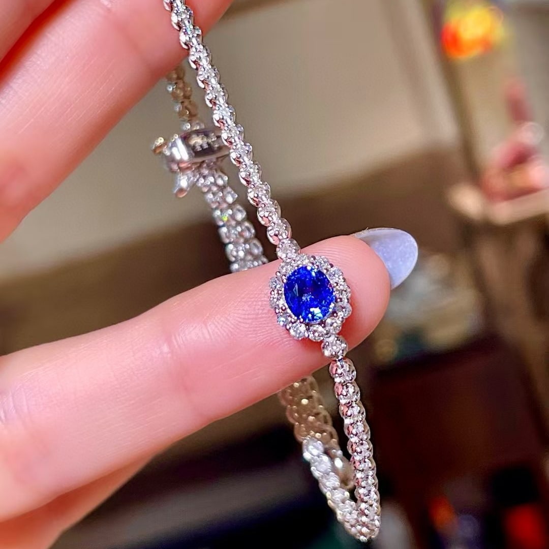 14k Gold 2.63 Ctw Natural Sapphire & Diamond Bracelet: Ref:230977237 // gold content:14k gold // main gemstone:sapphire // shape:oval // carat weight:1. 02ct // color:blue // treatment:natural // // adjacent gemstone 2 : diamond // shape:round &