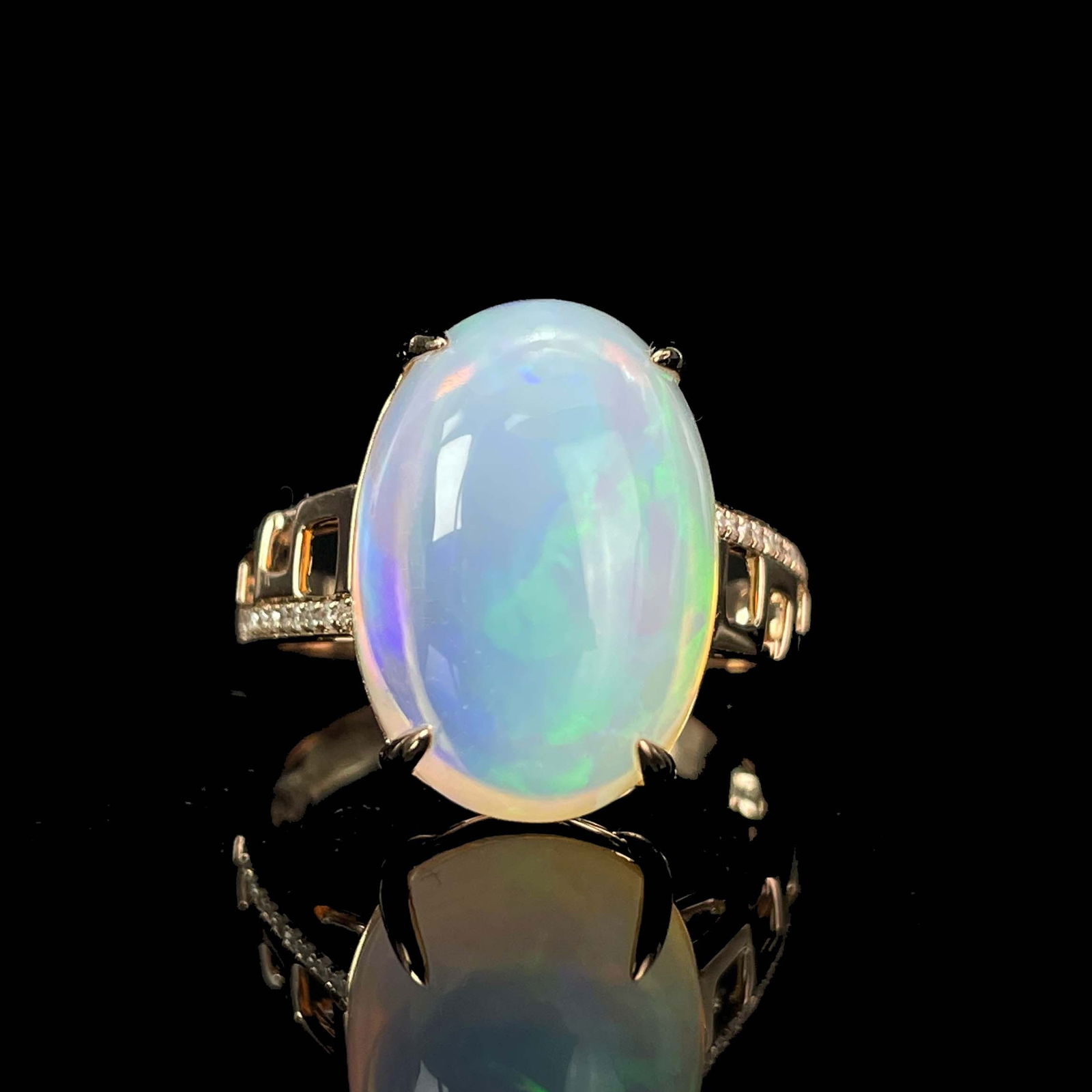 14k Gold 7.1 Ct Natural Opal & Diamond Ring: Ref:230977240 // gold content:14k gold // ring size:7. 25us // // main gemstone:opal // shape:oval // carat weight:7. 1ct // color:white // treatment:natural // // adjacent gemstone 2 : diamond //