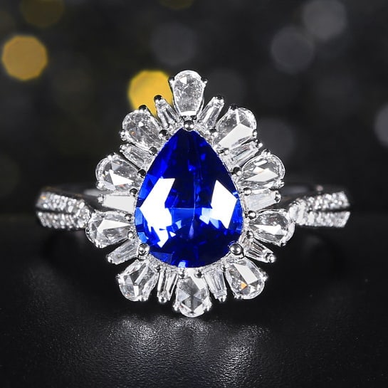 14k Gold 2.08 Ctw Natural Sapphire & Diamond Ring: Ref:230978006 // gold content:14k gold // ring size:7. 25us // // main gemstone:sapphire // shape:pear // carat weight:1. 62ct // color:cornflower blue // treatment:natural // // adjacent gemstone