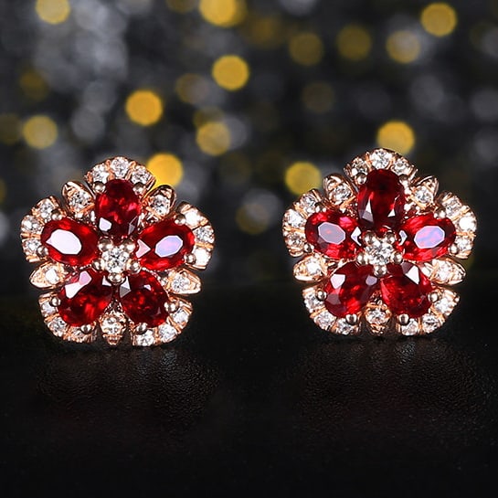 14k Gold 1.10 Ctw Natural Ruby & Diamond Earrings: Ref:230978020 // gold content:14k gold // main gemstone:ruby // shape:oval // carat weight:0. 96ct // color:red // treatment:natural // // adjacent gemstone 2 : diamond // number of stones:42 //