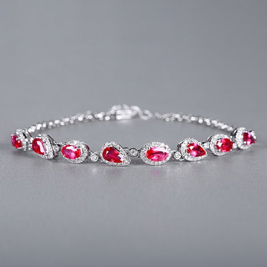 14k Gold 2.58 Ctw Natural Ruby & Diamond Bracelet: Ref:230978036 // gold content:14k gold // main gemstone:ruby // shape:multiply // carat weight:2. 08ct // color:red // treatment:natural // // adjacent gemstone 2 : diamond // number of stones:141