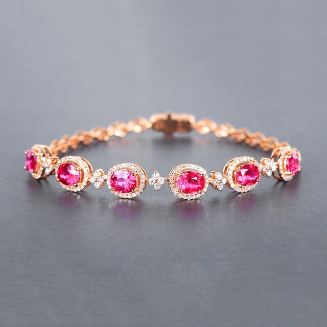 14k Gold 4.36 Ctw Natural Ruby & Diamond Bracelet: Ref:230978059 // gold content:14k gold // main gemstone:ruby // shape:oval // carat weight:3. 67ct // color:red // treatment:natural // // adjacent gemstone 2 : diamond // number of stones:166 //