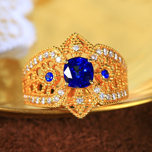 14k Gold 1.50 Ctw Natural Sapphire & Diamond Ring: Ref:230978062 // gold content:14k gold // ring size:7. 25us // // main gemstone:sapphire // shape:cushion // carat weight:1. 12ct // color:royal blue // treatment:natural // // adjacent gemstone 2