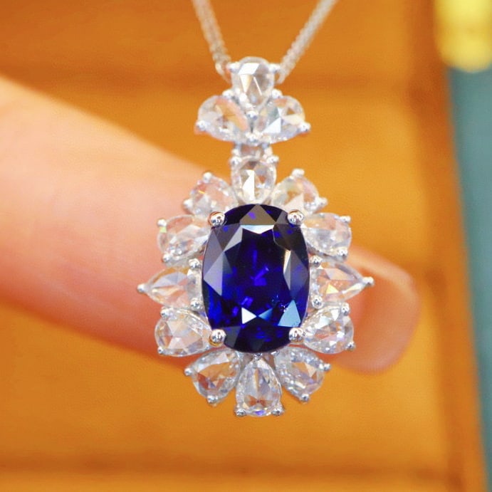 14k Gold 3.36 Ctw Natural Sapphire & Diamond Pendant( Without Chain ): Ref:230978102 // gold content:14k gold // main gemstone:sapphire // shape:oval // carat weight:2. 65ct // color:royal blue // treatment:natural // // adjacent gemstone 2 : diamond // number of stones: