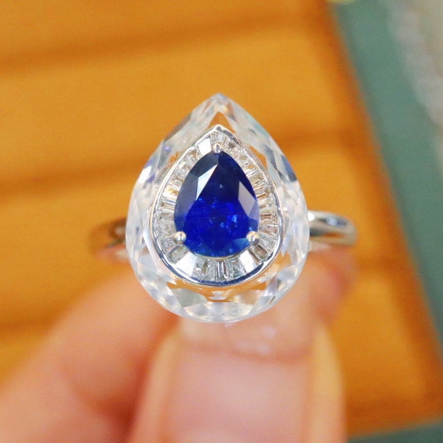 14k Gold 1.00 Ctw Natural Sapphire & Diamond Ring: Ref:230978132 // gold content:14k gold // ring size:7. 25us // // main gemstone:sapphire // shape:pear // carat weight:0. 85ct // color:royal blue // treatment:natural // // adjacent gemstone 2 :