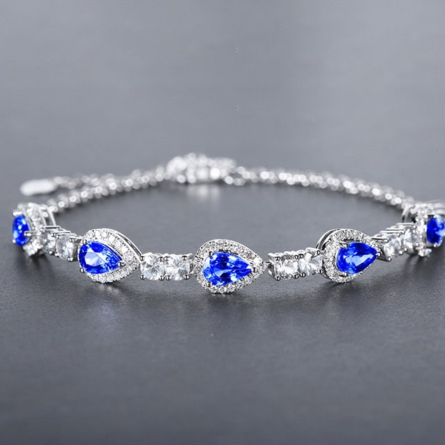 14k Gold 3.47 Ctw Natural Sapphire & Diamond Bracelet: Ref:230978133 // gold content:14k gold // main gemstone:sapphire // shape:pear // carat weight:3. 0ct // color:cornflower blue // treatment:natural // // adjacent gemstone 2 : diamond // number of