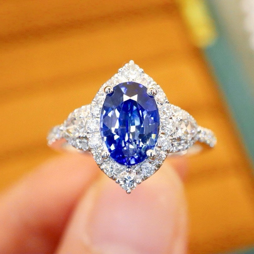 14k Gold 2.14 Ctw Natural Sapphire & Diamond Ring: Ref:230978201 // gold content:14k gold // ring size:7. 25us // // main gemstone:sapphire // shape:oval // carat weight:1. 70ct // color:royal blue // treatment:natural // // adjacent gemstone 2 :