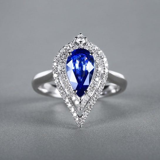 14k Gold 1.96 Ctw Natural Sapphire & Diamond Ring: Ref:230978205 // gold content:14k gold // ring size:7. 25us // // main gemstone:sapphire // shape:pear // carat weight:1. 63ct // color:royal blue // treatment:natural // // adjacent gemstone 2 :
