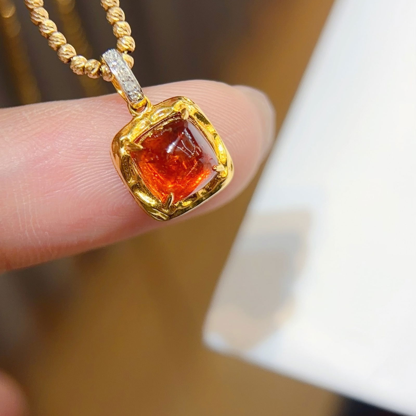 14k Gold 2 Ct Natural Spessartine & Diamond Pendant( Without Chain ): Ref:230978239 // gold content:14k gold // main gemstone:spessartine // shape:suger-loaf // carat weight:2ct // color:orange // treatment:natural // // adjacent gemstone 2 : diamond // shape:round