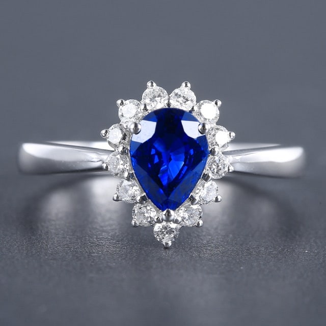 14k Gold 1.34 Ctw Natural Sapphire & Diamond Ring: Ref:230978255 // gold content:14k gold // ring size:7. 25us // // main gemstone:sapphire // shape:pear // carat weight:1. 08ct // color:blue // treatment:natural // // adjacent gemstone 2 :