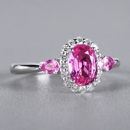 14k Gold 1.19 Ctw Natural Padparadscha Sapphire & Diamond Ring: Ref:230978287 // gold content:14k gold // ring size:7. 25us // // main gemstone:padparadscha sapphire // shape:oval // carat weight:1ct // color:orangish pink // treatment:natural // // adjacent