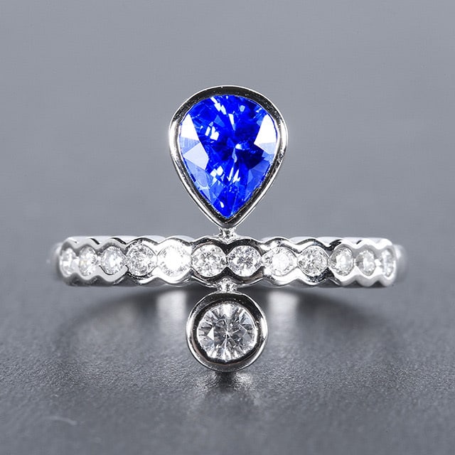 14k Gold 1.24 Ctw Natural Sapphire & Diamond Ring: Ref:230978290 // gold content:14k gold // ring size:7. 25us // // main gemstone:sapphire // shape:pear // carat weight:1ct // color:cornflower blue // treatment:natural // // adjacent gemstone 2 :