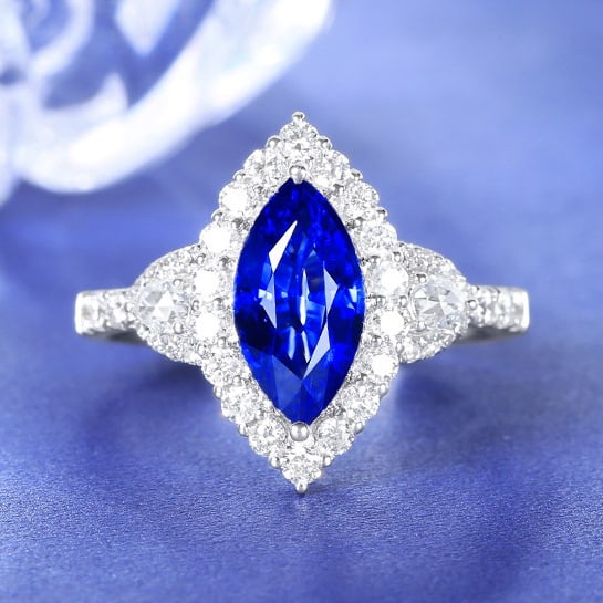 14k Gold 2.45 Ctw Natural Sapphire & Diamond Ring: Ref:230978321 // gold content:14k gold // ring size:7. 25us // // main gemstone:sapphire // shape:marquise // carat weight:1. 81ct // color:royal blue // treatment:natural // // adjacent gemstone