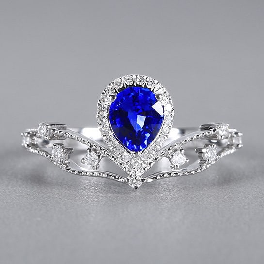 14k Gold 0.93 Ctw Natural Sapphire & Diamond Ring: Ref:230978340 // gold content:14k gold // ring size:7. 25us // // main gemstone:sapphire // shape:pear // carat weight:0. 72ct // color:royal blue // treatment:natural // // adjacent gemstone 2 :