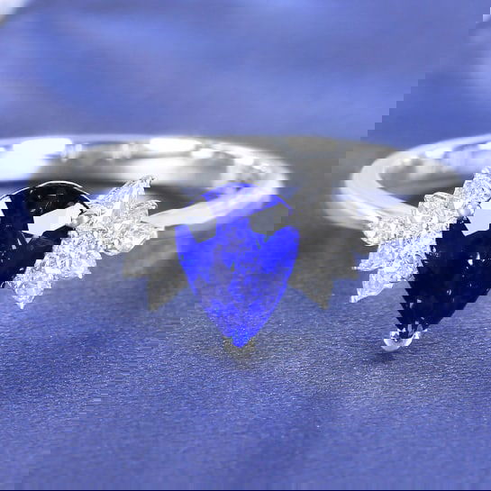 14k Gold 1.34 Ctw Natural Sapphire & Diamond Ring: Ref:230978367 // gold content:14k gold // ring size:7. 25us // // main gemstone:sapphire // shape:pear // carat weight:1. 22ct // color:royal blue // treatment:natural // // adjacent gemstone 2 :