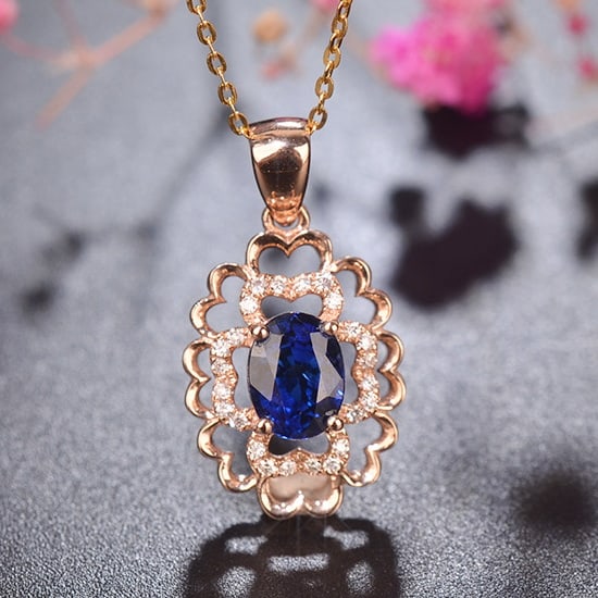 14k Gold 1.10 Ct Natural Sapphire & Diamond Pendant( Without Chain ): Ref:230978404 // gold content:14k gold // main gemstone:sapphire // shape:oval // carat weight:1. 10ct // color:royal blue // treatment:natural // // adjacent gemstone 2 : diamond // shape:round // cl