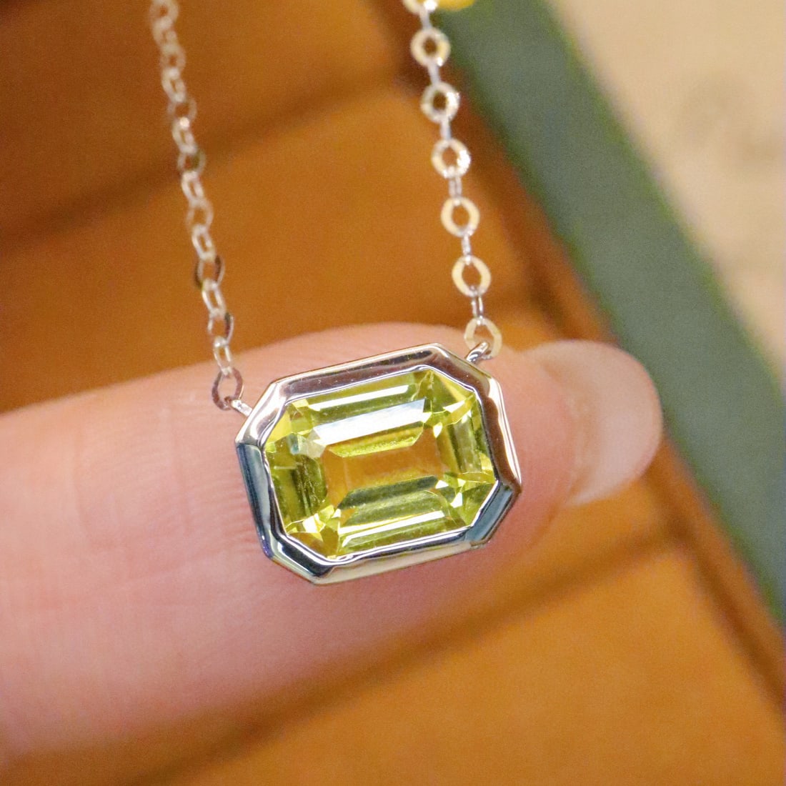14k Gold 1.49 Ct Natural Chrysoberyl Necklace: Ref:230978416 // gold content:14k gold // main gemstone:chrysoberyl // shape:octagonal // carat weight:1. 49ct // color:yellow // treatment:natural // Condition: NewLow Estimate: 3100.00High