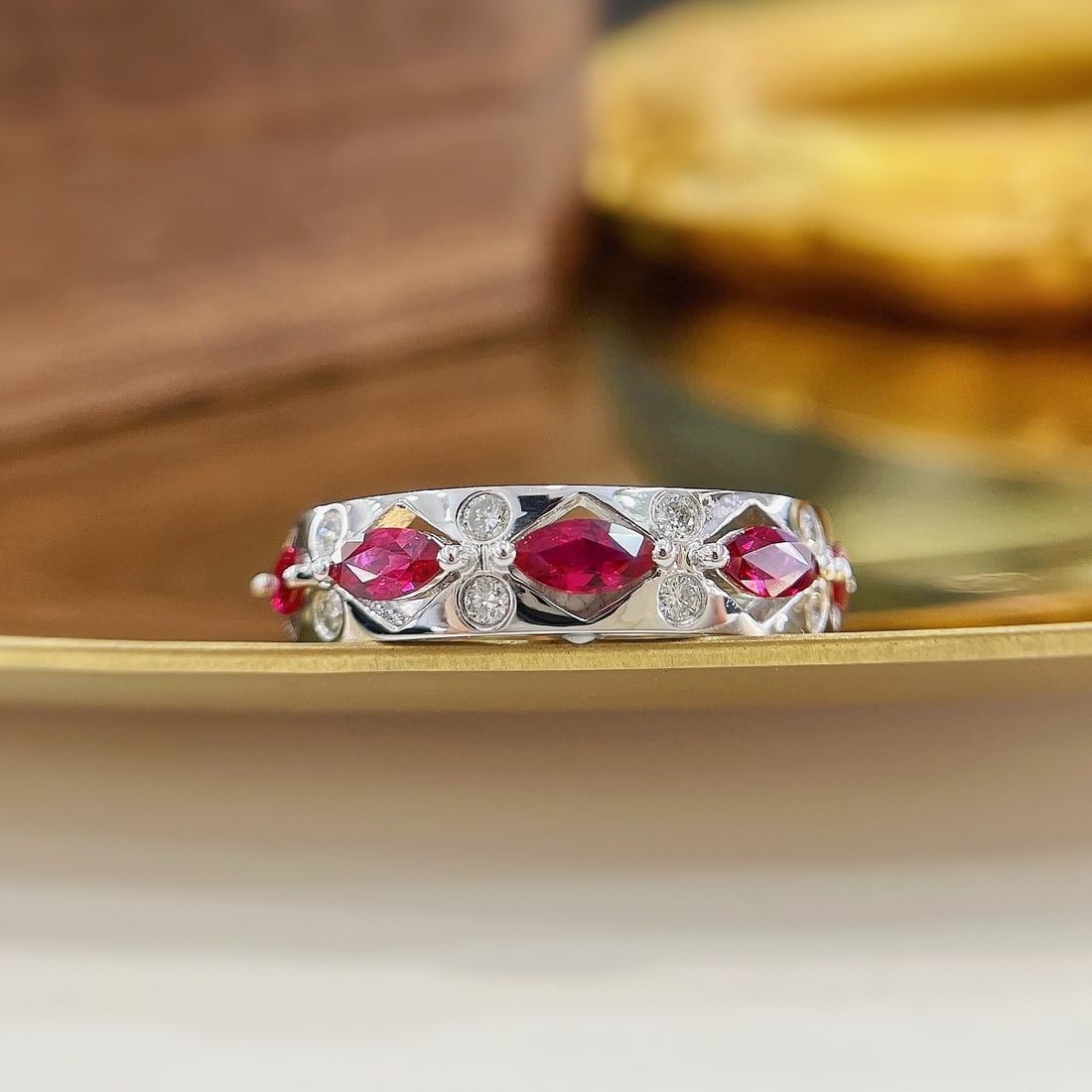 18k Gold 0.73 Ctw Natural Ruby & Diamond Ring: Ref:231125025 // gold content:18k gold // ring size:6. 25us // // main gemstone:ruby // shape:marquise // carat weight:0. 61ct // color:red // treatment:natural // // adjacent gemstone 2 : diamond //