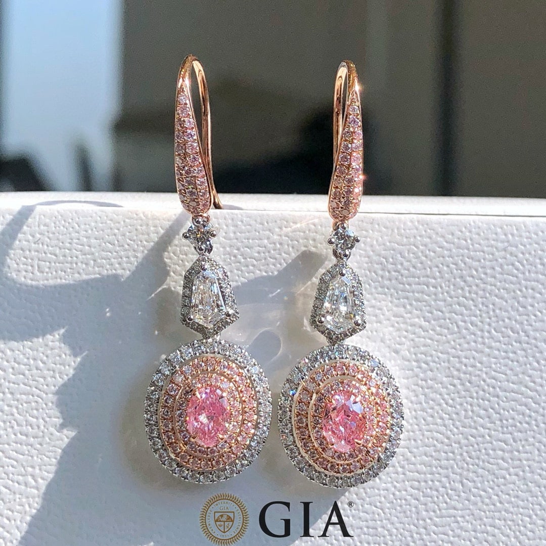Gia Certified 18k Gold 1.95 Ctw Natural Pink Diamond & Diamond Earrings: Ref:231125048 // gold content:18k gold // main gemstone:pink diamond // certified:gia // shape:oval // carat weight:0. 67ct // clarity grade:si1 // color:pink // treatment:natural // saturability:very