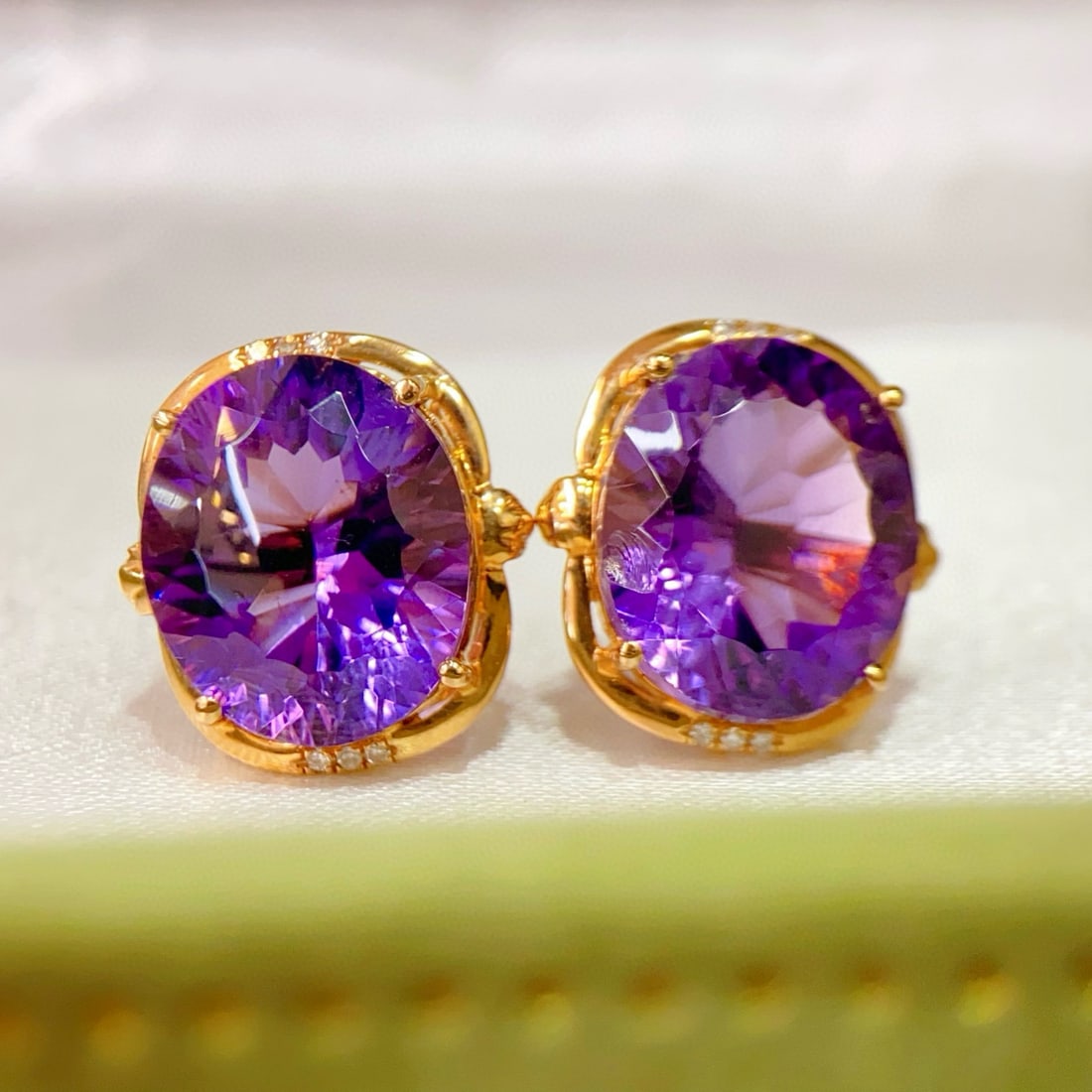 14k Gold 9.13 Ctw Natural Amethyst & Diamond Earrings: Ref:231125163 // gold content:14k gold // main gemstone:amethyst // shape:oval // carat weight:9. 1ct // color:purple // treatment:natural // // adjacent gemstone 2 : diamond // number of stones:12 //