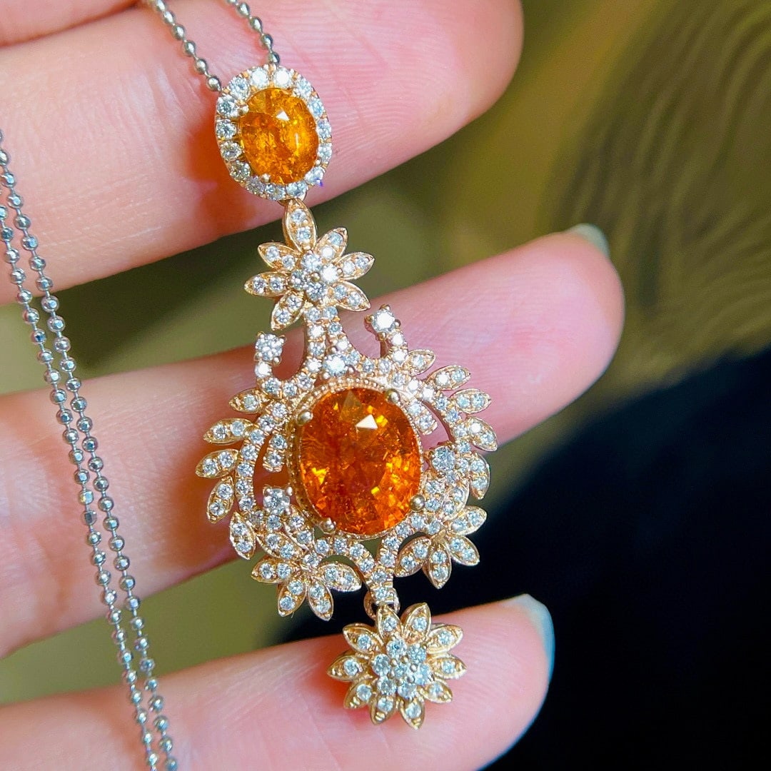 14k Gold 5.4 Ctw Natural Spessartine & Diamond Pendant( Without Chain ): Ref:231125194 // gold content:14k gold // main gemstone:spessartine // shape:oval // carat weight:4. 5ct // color:orange // treatment:natural // // adjacent gemstone 2 : diamond // shape:round // cara