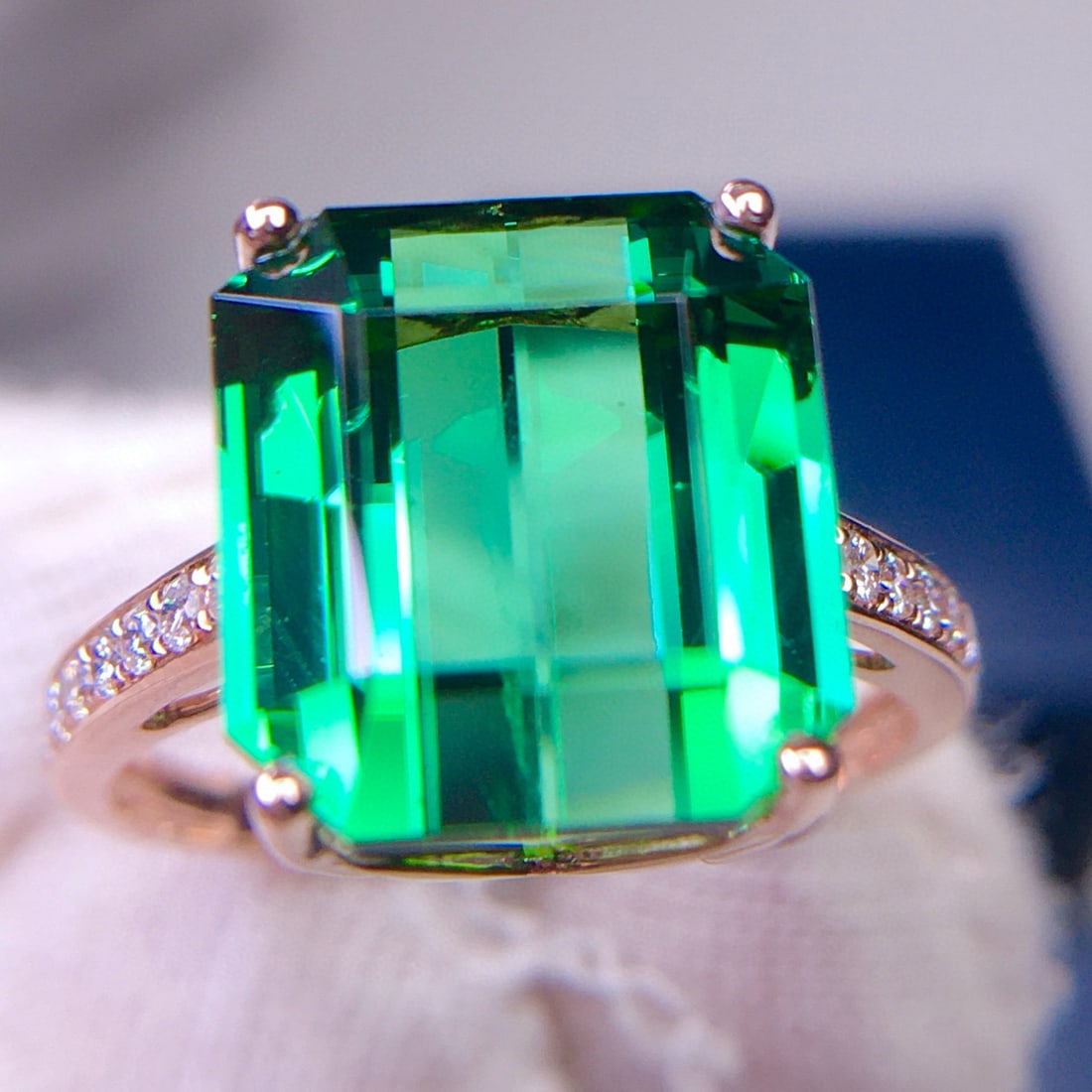 14k Gold 9.1 Ct Natural Tourmaline & Diamond Ring: Ref:231125196 // gold content:14k gold // ring size:7. 25us // // main gemstone:tourmaline // shape:octagonal // carat weight:9. 1ct // color:green // treatment:natural // // adjacent gemstone 2 : dia