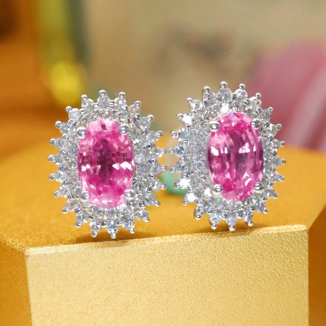 14k Gold 1.33 Ctw Natural Padparadscha Sapphire & Diamond Earrings: Ref:231125214 // gold content:14k gold // main gemstone:padparadscha sapphire // shape:oval // carat weight:1. 00ct // color:orangish pink // treatment:natural // // adjacent gemstone 2 : diamond // n