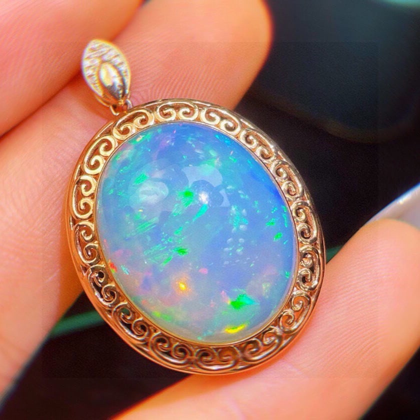14k Gold 14.23 Ct Natural Opal & Diamond Pendant( Without Chain ): Ref:231125219 // gold content:14k gold // main gemstone:opal // shape:oval // carat weight:14. 23ct // color:color // treatment:natural // // adjacent gemstone 2 : diamond // shape:round // clarity