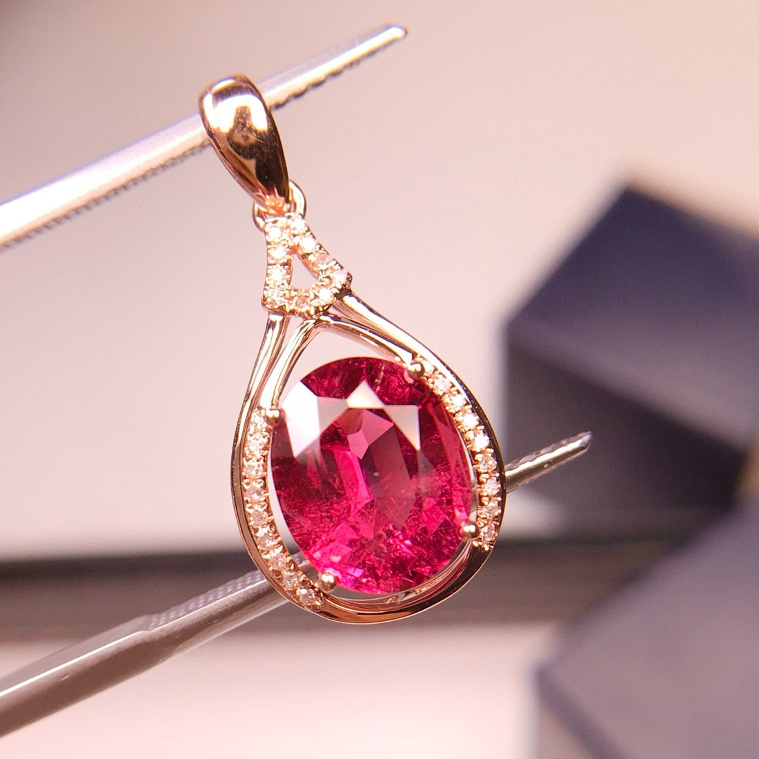 14k Gold 2.35 Ct Natural Tourmaline & Diamond Pendant( Without Chain ): Ref:231125246 // gold content:14k gold // main gemstone:tourmaline // shape:oval // carat weight:2. 35ct // color:red // treatment:natural // // adjacent gemstone 2 : diamond // shape:round // clarity